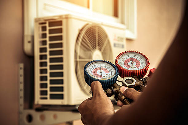 Professional Hvac technician working in Old Town, ME
